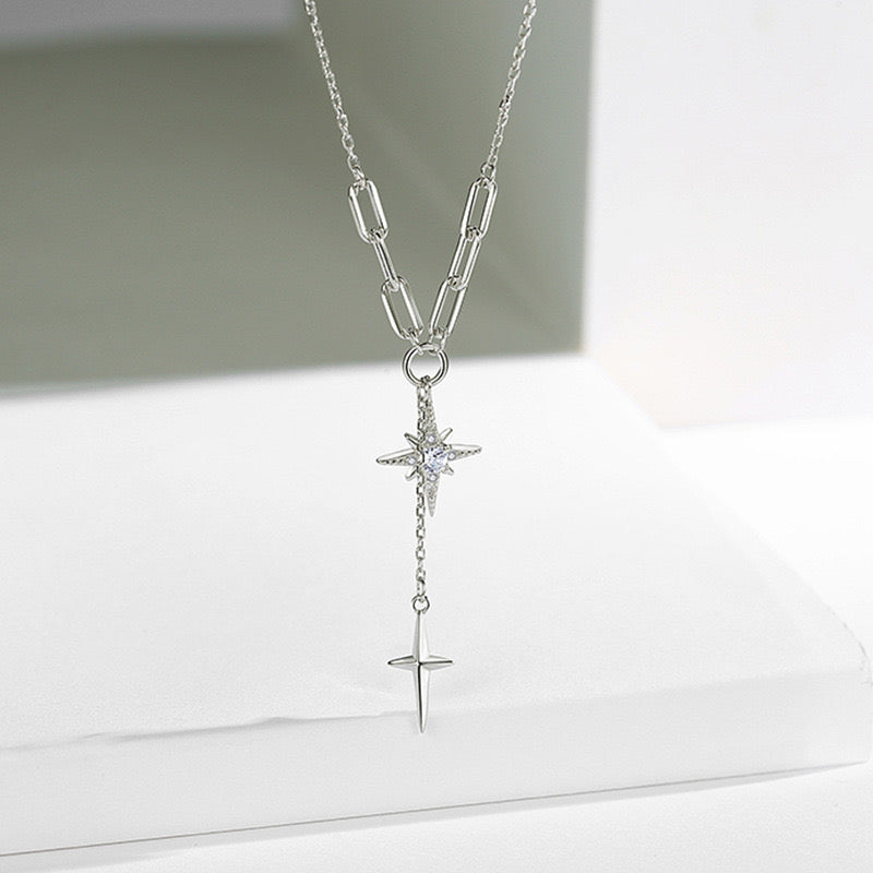 Dual north star lariat necklace pendant detail close-up