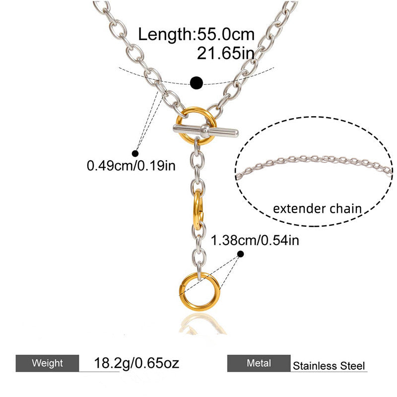 Two-tone OT toggle chain necklace worn on model with blue top