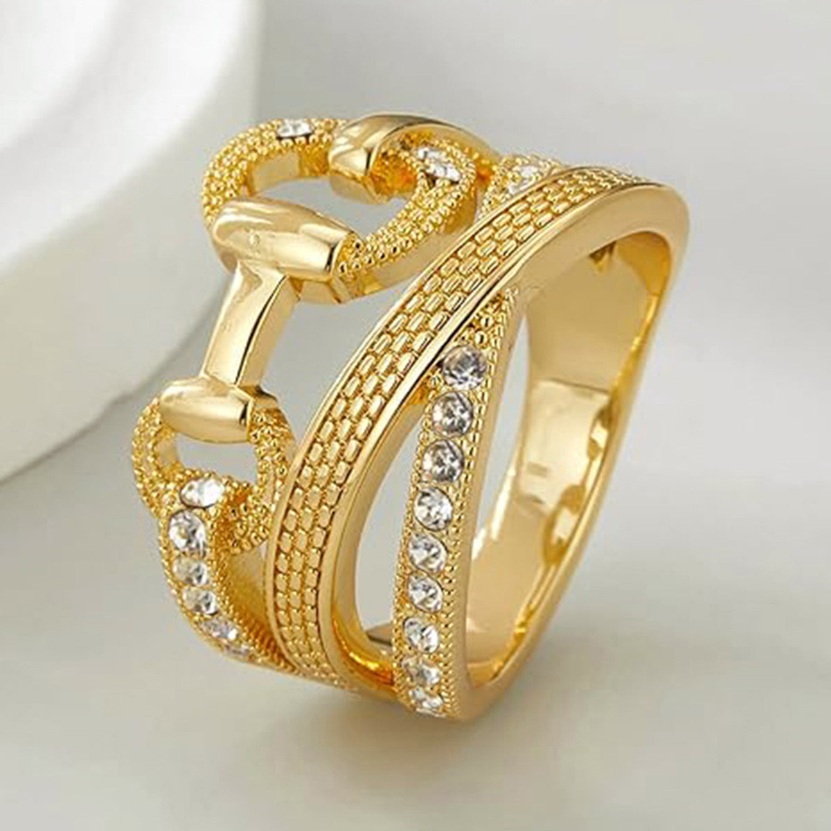 Gold CZ multi-band OT buckle ring product shot on white background angle 3